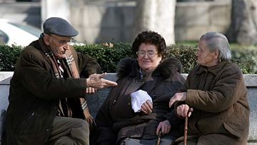 Group of elderly people talking