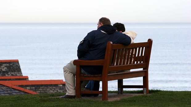 people sitting on bench